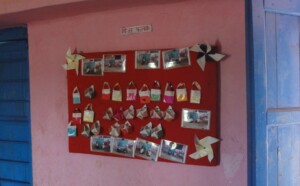 A soft-board on one corner of the room.