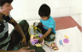 Kid playing with puzzle games