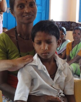 Umesh with his mother. Umesh has juvenile cataract in both the eyes and have not had clear vision since his birth. 