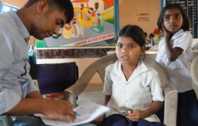 Suhrid Foundation's poster girl - Renuka - from Bahiram Pada school being checked by optometrist. Please check brochure cover page for her beautiful picture.