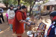 Ms Sumita Tembe offering prayer to goddess Saraswati at Guravpada - first school visited on that day.
