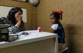 Dr Rashmi,  audiometrist, patiently evaluating case of Mayuri Mere