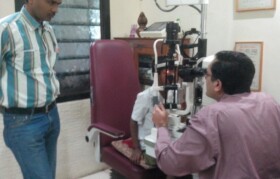 Umesh Ojhare being checked by Dr Ruvit Nikam. Umesh was accompanied by Umesh's school teacher Kamalkishore Salunke.