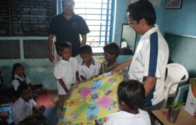 Team Suhrid giving them joining gift - Lego set and carrom board