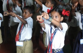 Children from Palavpada - reciting a poem with action!