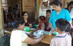 Check-up was arranged in the verandah of classroom in absence of electricity in classrooms