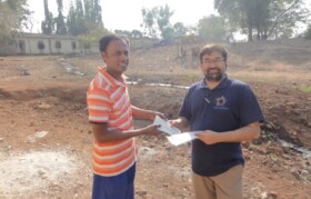 Team Suhrid handing over cheque for water project at Arvind Ashram Shala, Dadade