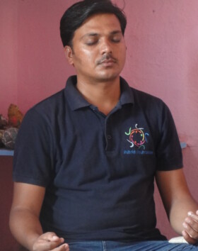 Teacher doing meditation conducted by faculty
