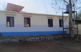 Back side of classroom needed repair and also water tank